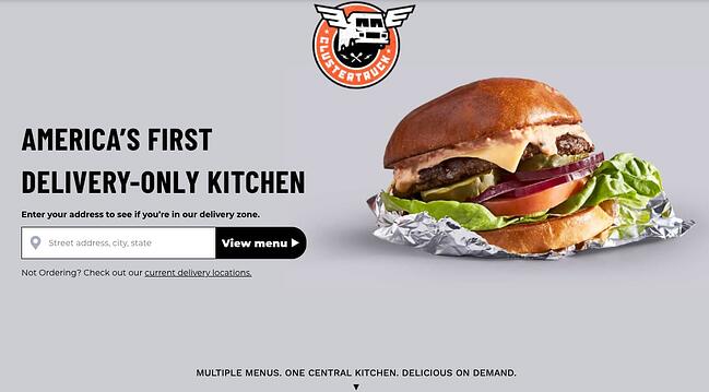 ClusterTruck网站上有一个汉堡和一个ext，上面写着“美国第一快递公司唯一的厨房”