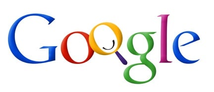 谷歌标志的早期迭代，其中O是一个带有笑脸的放大镜